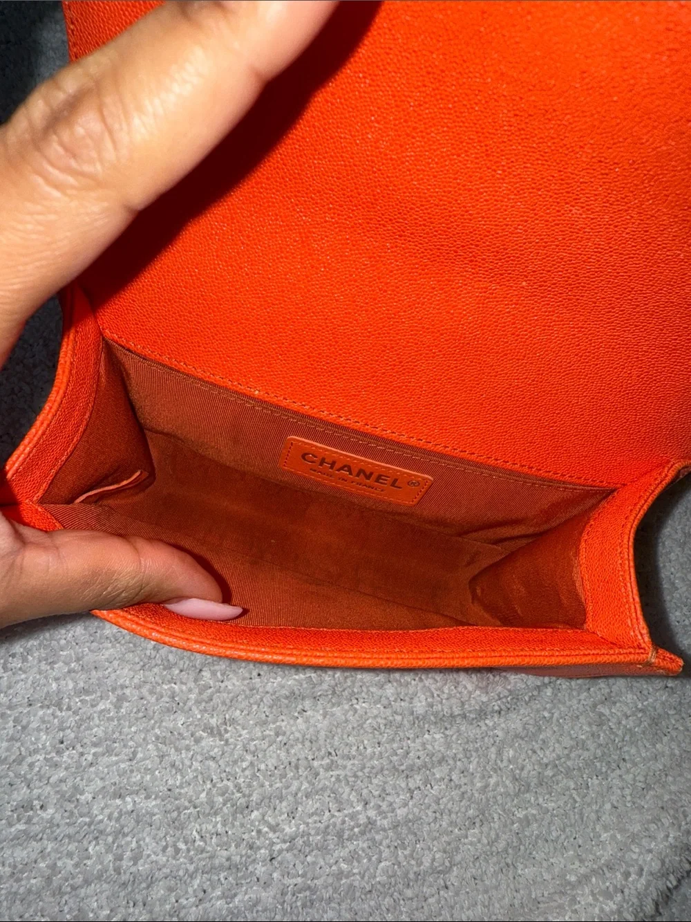 CHANEL Orange Quilted Boy Bag with Silver Chain